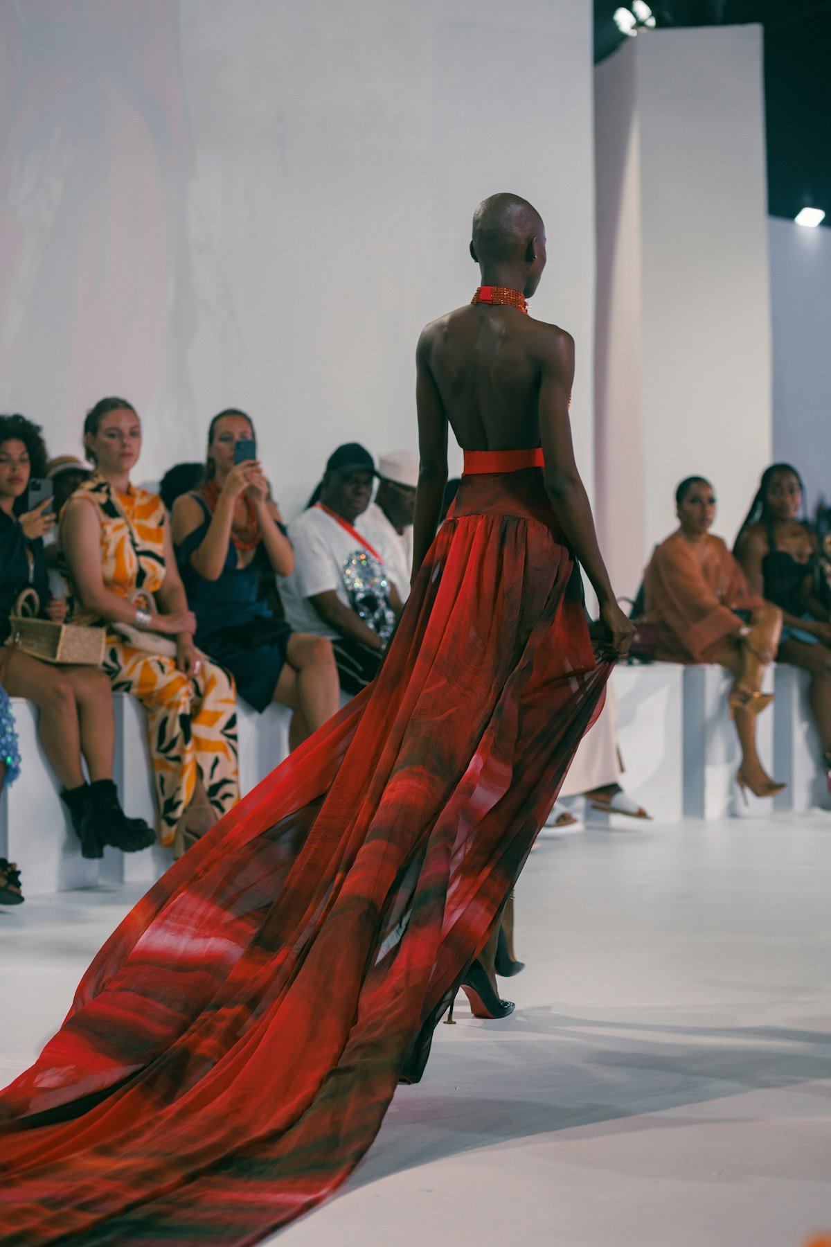 Fashion model on a runway in editorial lighting